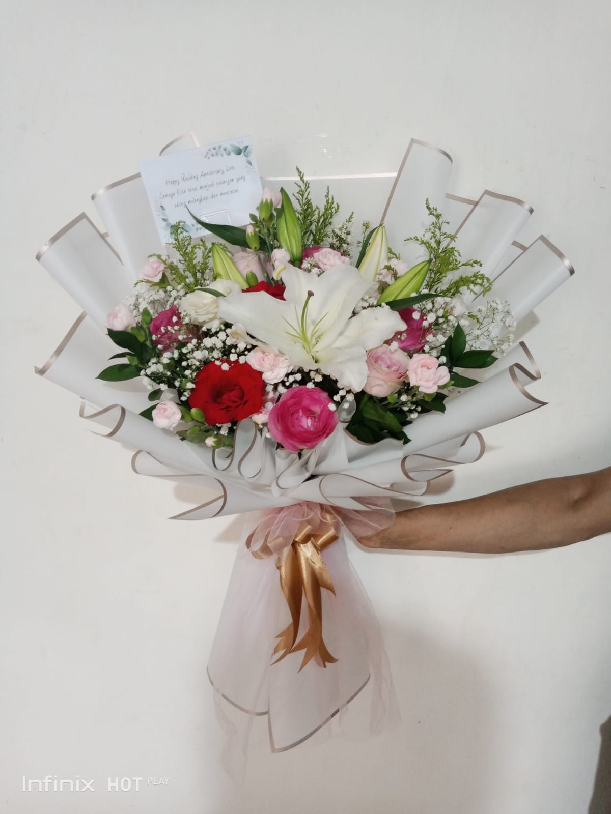 Bouquet pengantin tema rustic dengan bunga kering dan pita goni
